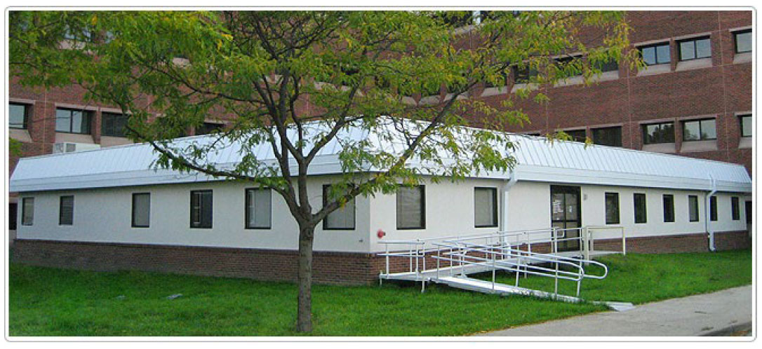 White building with wheel chair ramp