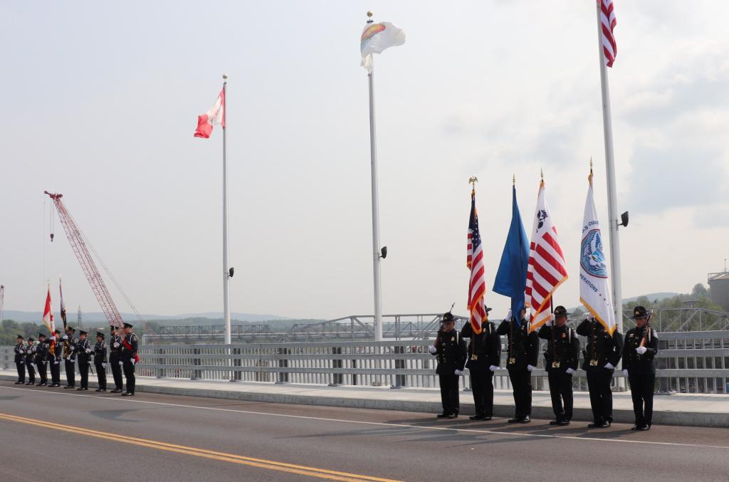 honor guards stand on the bridge